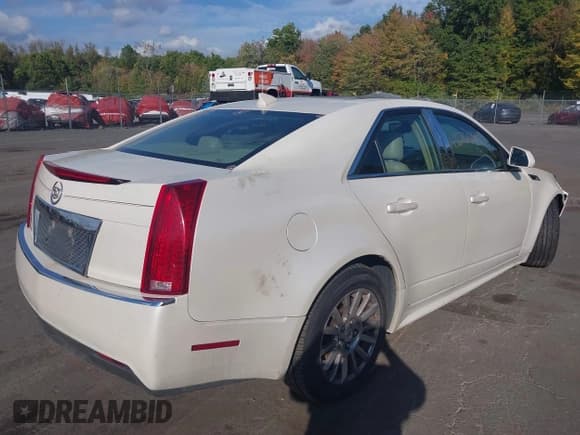 ✅ 2013 Cadillac CTS Luxury • VIN: 1G6DG5E57D0163994 • Lot: 43376631. Listed on IAAI with 132,088 mi. Free auction sales archive from the USA and detailed vehicle history report at DreamBid. Image 4.