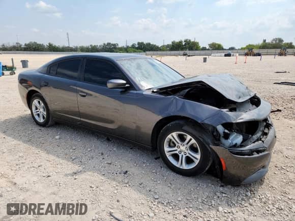 2022 Dodge Charger SXT with VIN 2C3CDXBG2NH224267, listed as a Copart auction lot 80954845 with 51,100 mi miles and Salvage title. Bid and sale history available at DreamBid. Image 4.