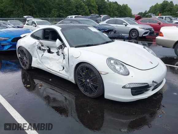 ✅ 2014 Porsche 911 Carrera • VIN: WP0AA2A91ES106639 • Lot: 42964632. Listed on IAAI with 67,429 mi. Free auction sales archive from the USA and detailed vehicle history report at DreamBid. Image 1.