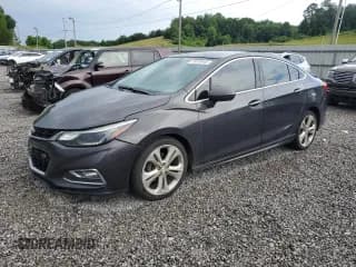 ✅ 2016 Chevrolet Cruze Premier • VIN: 1G1BG5SM5G7317137 • Lot: 59510405. Wystawiony na Copart z przebiegiem 196 139 mil. Bezpłatny archiwum sprzedaży aukcyjnych z USA i szczegółowy raport historii pojazdu na DreamBid. Zdjęcie 1.