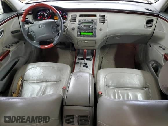 2006 Hyundai Azera SE с VIN KMHFC46F76A091674, выставлен на аукционе Copart как лот 47878195 с пробегом 204 930 миль миль и Чистый • Clean title. История ставок и продаж доступна на DreamBid. Изображение 8.