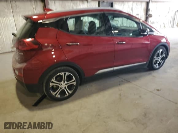✅ 2019 Chevrolet Bolt EV Premier • VIN: 1G1FZ6S06K4122141 • Лот: 82781575. Опубликован ранее на Copart с пробегом 56 484 миль. Бесплатный доступ к архиву аукционных продаж из США и подробный отчёт об истории автомобиля на DreamBid. Изображение 3.