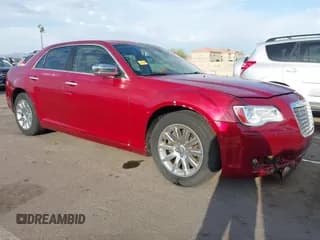 ✅ 2012 Chrysler 300 C • VIN: 2C3CCAET0CH195292 • Lot: 42609625. Listed on IAAI with 63,859 mi. Free auction sales archive from the USA and detailed vehicle history report at DreamBid. Image 1.