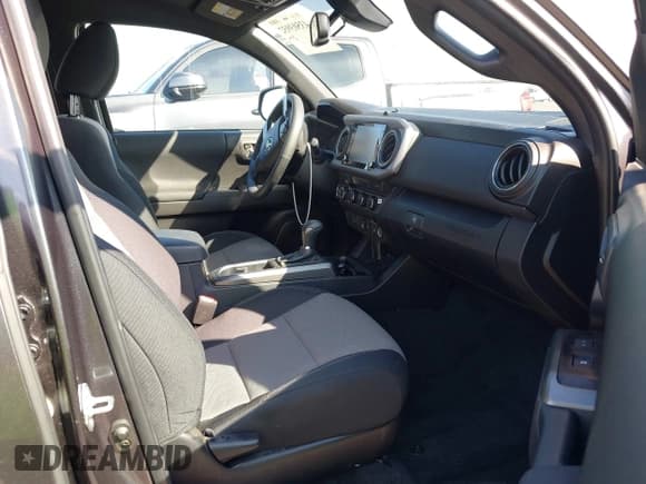 ✅ 2023 Toyota Tacoma TRD Off Road • VIN: 3TMCZ5AN7PM637078 • Lot: 43503932. Listed on IAAI with 28,152 mi. Free auction sales archive from the USA and detailed vehicle history report at DreamBid. Image 5.