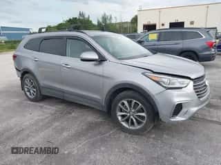 2017 Hyundai Santa Fe SE z VIN KM8SM4HF1HU243832, wystawiony jako IAAI lot #43320326 z przebiegiem 86 588 mil mil oraz . Historia ofert i sprzedaży dostępna na DreamBid. Obrazek 1.