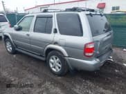 ✅ 2001 Nissan Pathfinder LE • VIN: JN8DR09Y51W607613 • Lot: 43617902. Listed on IAAI with 207,278 mi. Free auction sales archive from the USA and detailed vehicle history report at DreamBid. Image 3.