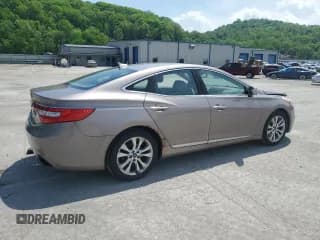✅ 2013 Hyundai Azera • VIN: KMHFG4JG4DA240690 • Лот: 57465565. Опубликован ранее на Copart с пробегом 164 757 миль. Бесплатный доступ к архиву аукционных продаж из США и подробный отчёт об истории автомобиля на DreamBid. Изображение 3.