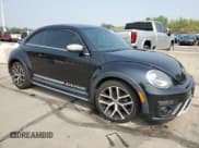 ✅ 2016 Volkswagen Beetle Dune • VIN: 3VWS17AT1GM629861 • Lot: 64095904. Listed on Copart with 81,154 mi. Free auction sales archive from the USA and detailed vehicle history report at DreamBid. Image 4.