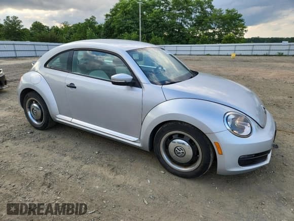 ✅ 2015 Volkswagen Beetle Fleet Edition • VIN: 3VWF17ATXFM603372 • Lot: 65582455. Listed on Copart with 56,785 mi. Free auction sales archive from the USA and detailed vehicle history report at DreamBid. Image 4.