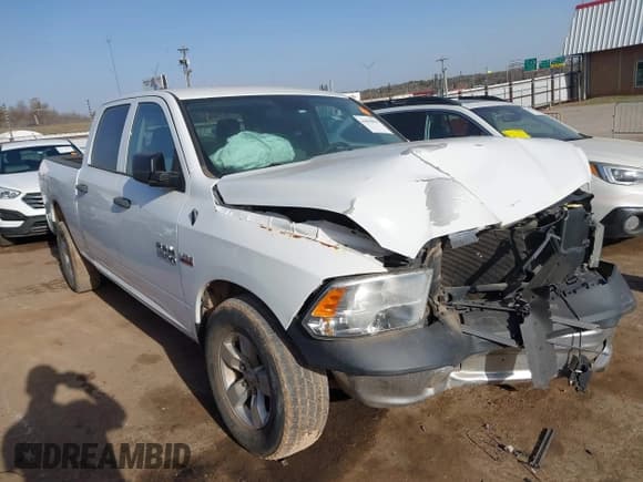 ✅ 2018 Ram 1500 Tradesman • VIN: 1C6RR6STXJS280045 • Lot: 41810856. Listed on IAAI with 111,797 mi. Free auction sales archive from the USA and detailed vehicle history report at DreamBid. Image 1.