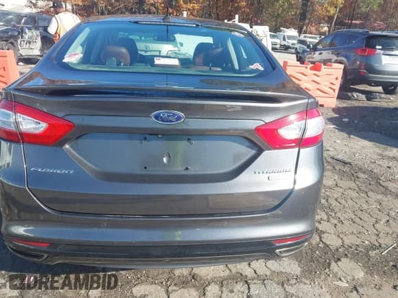 ✅ 2016 Ford Fusion Titanium • VIN: 3FA6P0K96GR140023 • Lot: 43714831. Listed on IAAI with 144,663 mi. Free auction sales archive from the USA and detailed vehicle history report at DreamBid. Image 16.