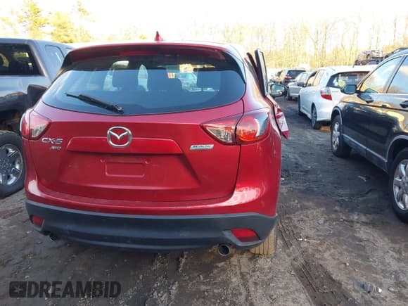 ✅ 2016 Mazda CX-5 Sport • VIN: JM3KE4BY3G0602140 • Lot: 43855403. Listed on IAAI with 169,571 mi. Free auction sales archive from the USA and detailed vehicle history report at DreamBid. Image 4.