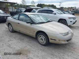 ✅ 1997 Saturn SC • VIN: 1G8ZE1285VZ125476 • Лот: 41832482. Опубликован ранее на IAAI с пробегом 186 269 миль. Бесплатный доступ к архиву аукционных продаж из США и подробный отчёт об истории автомобиля на DreamBid. Изображение 1.