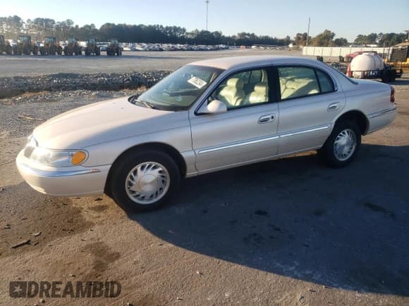 ✅ 1998 Lincoln Continental • VIN: 1LNFM97V3WY647762 • Lot: 77062294. Listed on Copart with 153,553 mi. Free auction sales archive from the USA and detailed vehicle history report at DreamBid. Image 1.