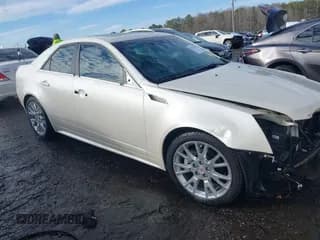 ✅ 2012 Cadillac CTS Premium • VIN: 1G6DP5E3XC0144157 • Lot: 41311350. Listed on IAAI with 96,042 mi. Free auction sales archive from the USA and detailed vehicle history report at DreamBid. Image 1.