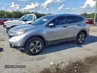✅ 2019 Honda CR-V LX • VIN: 2HKRW5H33KH421668 • Лот: 94436435. Опубликован ранее на Copart с пробегом 104 104 миль. Бесплатный доступ к архиву аукционных продаж из США и подробный отчёт об истории автомобиля на DreamBid. Изображение 1.