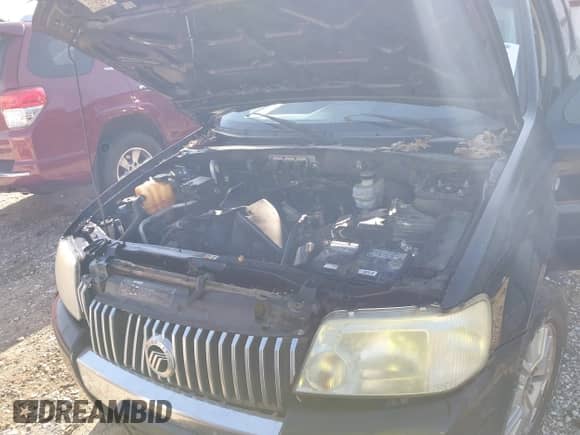 2005 Mercury Mariner Luxury z VIN 4M2YU561X5DJ15381, wystawiony jako IAAI lot #41295590 z przebiegiem 215 077 mil mil oraz . Historia ofert i sprzedaży dostępna na DreamBid. Obrazek 10.