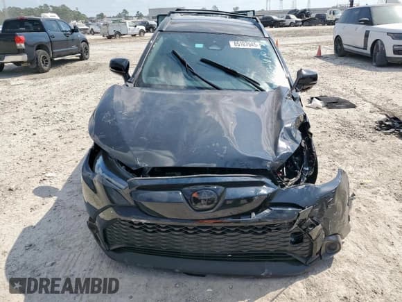 ✅ 2024 Toyota Corolla Cross Hybrid Nightshade Edition • VIN: 7MUFBABG4RV059413 • Lot: 85107045. Listed on Copart with 20,404 mi. Free auction sales archive from the USA and detailed vehicle history report at DreamBid. Image 5.