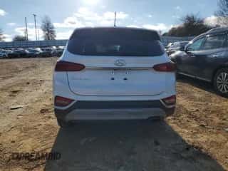 2019 Hyundai Santa Fe SE z VIN 5NMS23AD1KH102433, wystawiony jako Copart lot #71176022 z przebiegiem 70 051 mil mil oraz . Historia ofert i sprzedaży dostępna na DreamBid. Obrazek 6.