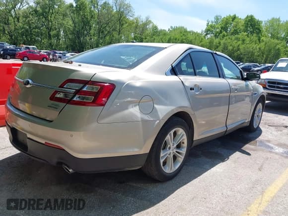 ✅ 2018 Ford Taurus SEL • VIN: 1FAHP2E8XJG131072 • Lot: 42145853. Listed on IAAI with 44,001 mi. Free auction sales archive from the USA and detailed vehicle history report at DreamBid. Image 4.