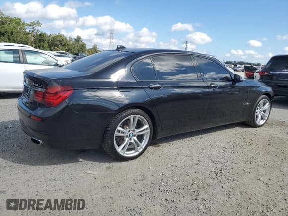 ✅ 2013 BMW 7 Series 740Li • VIN: WBAYE4C50DD137499 • Лот: 90041035. Опубликован ранее на Copart с пробегом 87 822 миль. Бесплатный доступ к архиву аукционных продаж из США и подробный отчёт об истории автомобиля на DreamBid. Изображение 3.