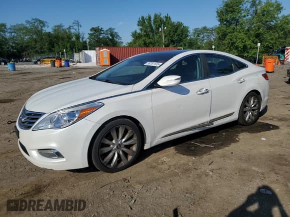 ✅ 2013 Hyundai Azera • VIN: KMHFH4JG6DA262297 • Лот: 56781155. Опубликован ранее на Copart с пробегом 234 793 миль. Бесплатный доступ к архиву аукционных продаж из США и подробный отчёт об истории автомобиля на DreamBid. Изображение 1.