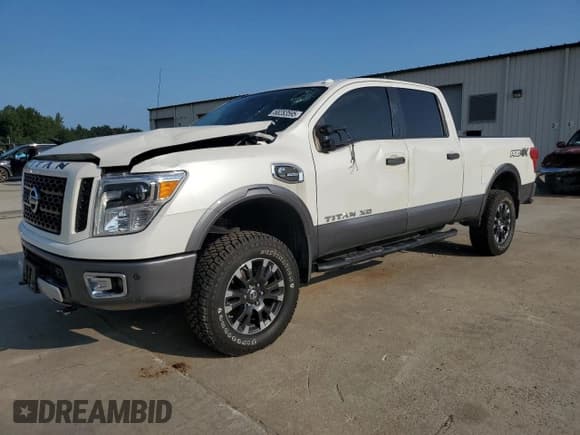 ✅ 2018 Nissan Titan Pro-4X • VIN: 1N6BA1F41JN520957 • Lot: 68283595. Wystawiony na Copart z przebiegiem 115 799 mil. Bezpłatny archiwum sprzedaży aukcyjnych z USA i szczegółowy raport historii pojazdu na DreamBid. Zdjęcie 1.