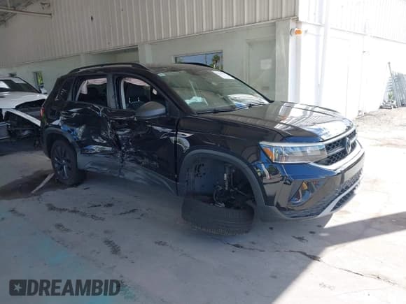 ✅ 2023 Volkswagen Taos S • VIN: 3VVCX7B2XPM313520 • Лот: 43316133. Опубликован ранее на IAAI с пробегом 95 059 миль. Бесплатный доступ к архиву аукционных продаж из США и подробный отчёт об истории автомобиля на DreamBid. Изображение 1.