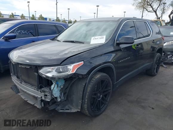✅ 2020 Chevrolet Traverse LS • VIN: 1GNERFKW9LJ228083 • Lot: 43657100. Listed on IAAI with 62,767 mi. Free auction sales archive from the USA and detailed vehicle history report at DreamBid. Image 2.