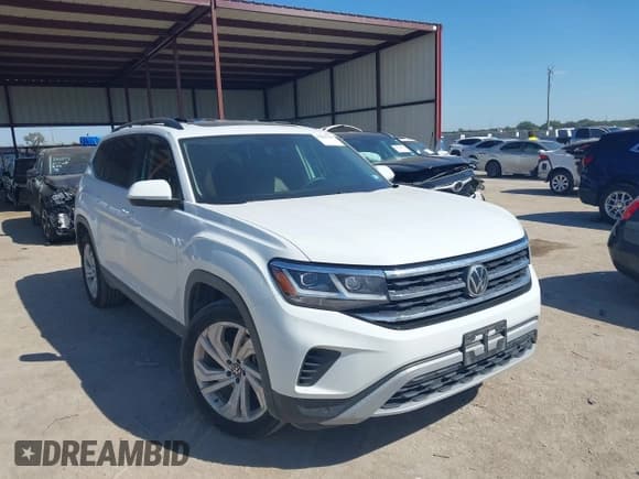 ✅ 2021 Volkswagen Atlas SE • VIN: 1V2JR2CA1MC591596 • Lot: 43369790. Listed on IAAI with 77,366 mi. Free auction sales archive from the USA and detailed vehicle history report at DreamBid. Image 1.