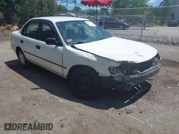 ✅ 1993 Toyota Corolla • VIN: 2T1AE09E6PC029698 • Lot: 42807151. Listed on IAAI with 125,417 mi. Free auction sales archive from the USA and detailed vehicle history report at DreamBid. Image 1.