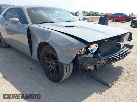 2012 Dodge Challenger SXT Plus z VIN 2C3CDYAG8CH176729, wystawiony jako IAAI lot #43219864 z przebiegiem 165 076 mil mil oraz . Historia ofert i sprzedaży dostępna na DreamBid. Obrazek 6.