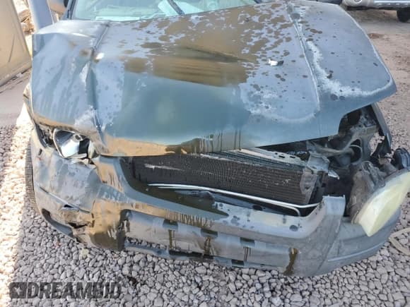 ✅ 2004 Ford Escape XLS • VIN: 1FMCU02124KA70628 • Lot: 89107055. Listed on Copart with 207,460 mi. Free auction sales archive from the USA and detailed vehicle history report at DreamBid. Image 12.