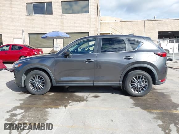 ✅ 2019 Mazda CX-5 Touring • VIN: JM3KFACM6K1501281 • Lot: 43650097. Listed on IAAI with 82,231 mi. Free auction sales archive from the USA and detailed vehicle history report at DreamBid. Image 15.