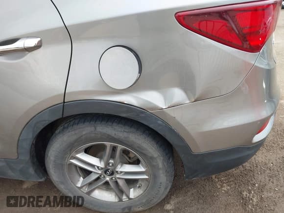 ✅ 2018 Hyundai Santa Fe 2.4L • VIN: 5NMZTDLB9JH078832 • Лот: 43147812. Опубликован ранее на IAAI с пробегом 122 368 миль. Бесплатный доступ к архиву аукционных продаж из США и подробный отчёт об истории автомобиля на DreamBid. Изображение 6.