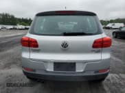 ✅ 2013 Volkswagen Tiguan SE • VIN: WVGBV7AX8DW521478 • Lot: 59664935. Listed on Copart with 100,996 mi. Free auction sales archive from the USA and detailed vehicle history report at DreamBid. Image 6.