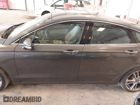 ✅ 2016 Ford Fusion Titanium • VIN: 3FA6P0D9XGR223354 • Lot: 42621924. Listed on IAAI with Not provided. Free auction sales archive from the USA and detailed vehicle history report at DreamBid. Image 14.
