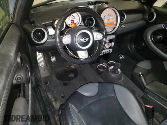 ✅ 2010 MINI Convertible S • VIN: WMWMS3C53ATY51016 • Lot: 67372035. Listed on Copart with 93,228 mi. Free auction sales archive from the USA and detailed vehicle history report at DreamBid. Image 8.