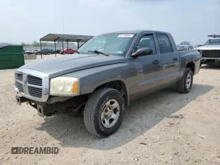 ✅ 2005 Dodge Dakota ST • VIN: 1D7HW28N15S237031 • Лот: 67138465. Опубликован ранее на Copart с пробегом 222 592 миль. Бесплатный доступ к архиву аукционных продаж из США и подробный отчёт об истории автомобиля на DreamBid. Изображение 1.