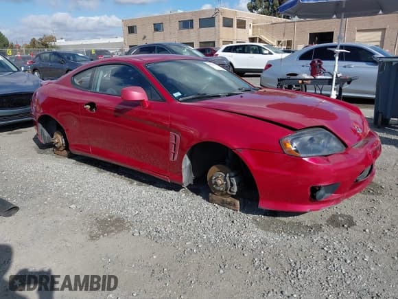 ✅ 2005 Hyundai Tiburon GS • VIN: KMHHM65D45U183100 • Лот: 43627934. Опубликован ранее на IAAI с пробегом 130 401 миль. Бесплатный доступ к архиву аукционных продаж из США и подробный отчёт об истории автомобиля на DreamBid. Изображение 1.