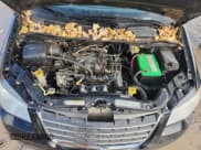 ✅ 2010 Chrysler Town & Country Touring • VIN: 2A4RR5D11AR104902 • Lot: 91252665. Listed on Copart with 181,368 mi. Free auction sales archive from the USA and detailed vehicle history report at DreamBid. Image 12.