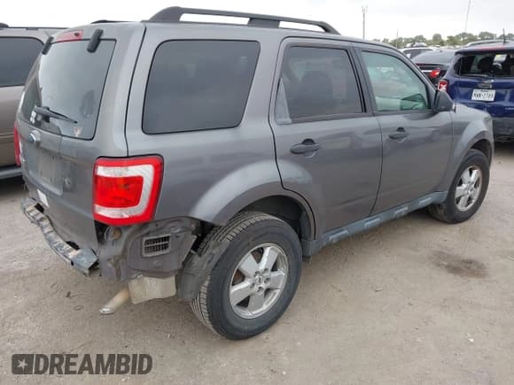 ✅ 2009 Ford Escape XLT • VIN: 1FMCU03779KA15621 • Lot: 43503931. Listed on IAAI with 225,020 mi. Free auction sales archive from the USA and detailed vehicle history report at DreamBid. Image 4.