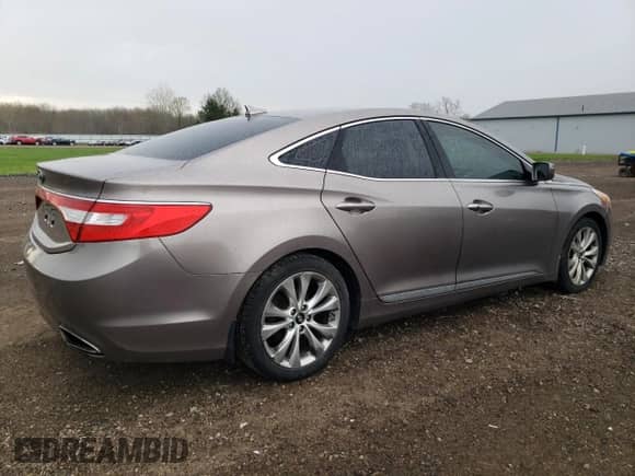 ✅ 2013 Hyundai Azera • VIN: KMHFG4JG7DA216478 • Lot: 53998885. Wystawiony na Copart z przebiegiem 154 277 mil mil. Skorzystaj z bezpłatnego archiwum sprzedaży aukcyjnych z USA i zobacz szczegółowy raport historii pojazdu na DreamBid. Zdjęcie 3.