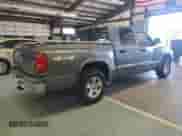 2006 Dodge Dakota SLT z VIN 1D7HW48N26S619341, wystawiony jako Copart lot #70210794 z przebiegiem 81 671 mil mil oraz Czysty tytuł • Clean title. Historia ofert i sprzedaży dostępna na DreamBid. Obrazek 3.