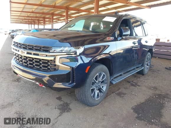 2022 Chevrolet Tahoe Z71 z VIN 1GNSKPKD3NR328938, wystawiony jako IAAI lot #42724313 z przebiegiem 46 394 mil mil oraz . Historia ofert i sprzedaży dostępna na DreamBid. Obrazek 2.