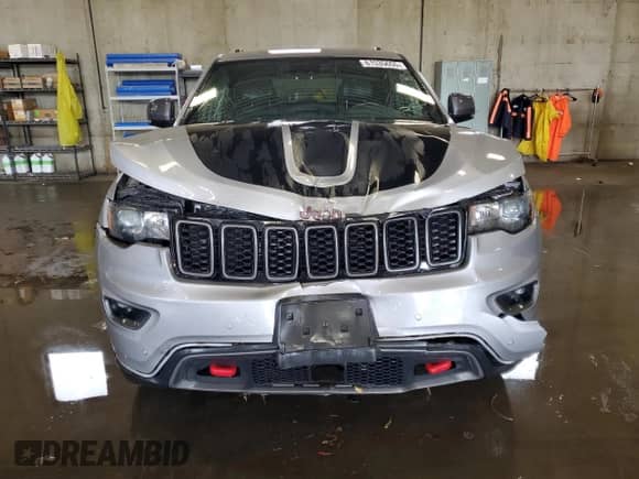 2019 Jeep Grand Cherokee Trailhawk с VIN 1C4RJFLT9KC855777, выставлен на аукционе Copart как лот 61535655 с пробегом 60 152 миль миль и Списание • Salvage title. История ставок и продаж доступна на DreamBid. Изображение 5.