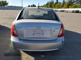 2010 Hyundai Accent GLS z VIN KMHCN4AC6AU430832, wystawiony jako Copart lot #75715324 z przebiegiem 124 600 mil mil oraz Szkoda całkowita • Salvage title. Historia ofert i sprzedaży dostępna na DreamBid. Obrazek 6.