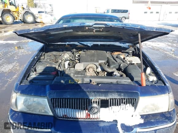 ✅ 2005 Mercury Grand Marquis GS • VIN: 2MEFM74W55X672987 • Lot: 43837809. Listed on IAAI with 117,537 mi. Free auction sales archive from the USA and detailed vehicle history report at DreamBid. Image 10.