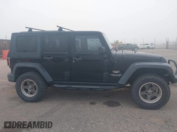 ✅ 2008 Jeep Wrangler Unlimited Sahara • VIN: 1J4GA59158L636793 • Lot: 43466197. Listed on IAAI with 239,794 mi. Free auction sales archive from the USA and detailed vehicle history report at DreamBid. Image 13.