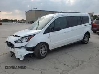 ✅ 2022 Ford Transit Connect XLT • VIN: NM0GE9F27N1511264 • Lot: 66682384. Listed on Copart with 34,754 mi. Free auction sales archive from the USA and detailed vehicle history report at DreamBid. Image 1.